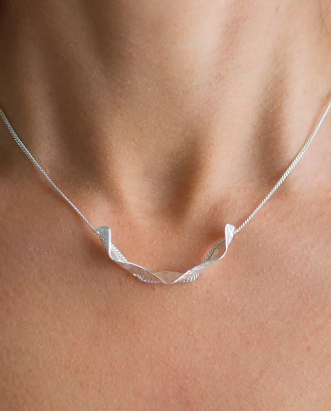 colgante-origami-plata.jpg Colgante origami